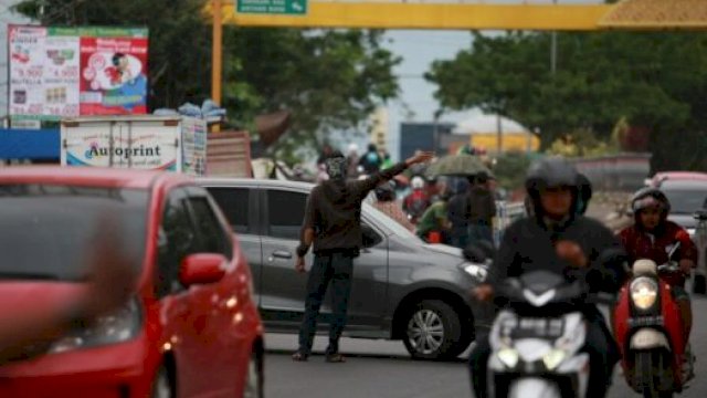 Ilustrasi Pak Ogah. (Foto/Int)