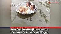 VIDEO: Manfaatkan Banjir, Bocah Ini Bermain Perahu Pakai Wajan