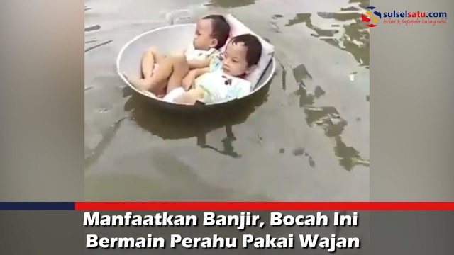VIDEO: Manfaatkan Banjir, Bocah Ini Bermain Perahu Pakai Wajan