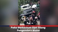 VIDEO: Polisi Berkostum Ojol Tilang Pengendara Motor