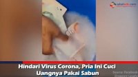 VIDEO: Hindari Virus Corona, Pria Ini Cuci Uangnya Pakai Sabun
