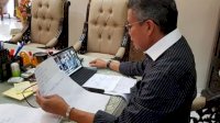Taufan Laporkan Perkembangan Covid-19 ke NA Via Teleconference