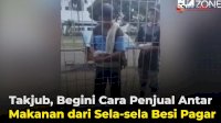 VIDEO: Takjub, Begini Cara Penjual Antar Makanan dari Sela-sela Besi Pagar