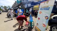 Pjs Bupati dan Forkopimda Sasar Pasar Minasamaupa Sosialisasi Perda dan Bagikan Masker