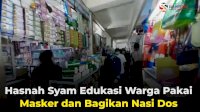 Hasnah Syam Edukasi Warga Pakai Masker dan Bagikan Nasi Dos