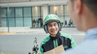 Grab Bersama OTO Group Ringankan Angsuran Mitra Pengemudi