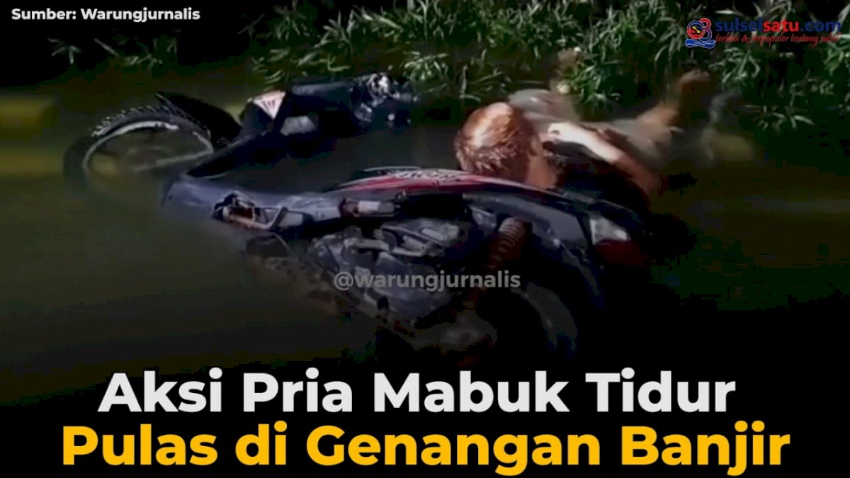 VIDEO: Aksi Pria Mabuk Tidur Pulas di Genangan Banjir