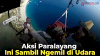 VIDEO: Aksi Paralayang Ini Sambil Ngemil di Udara