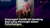 VIDEO: Pramugari Cantik Ini Gendong Bayi yang Menangis dalam Penerbangan