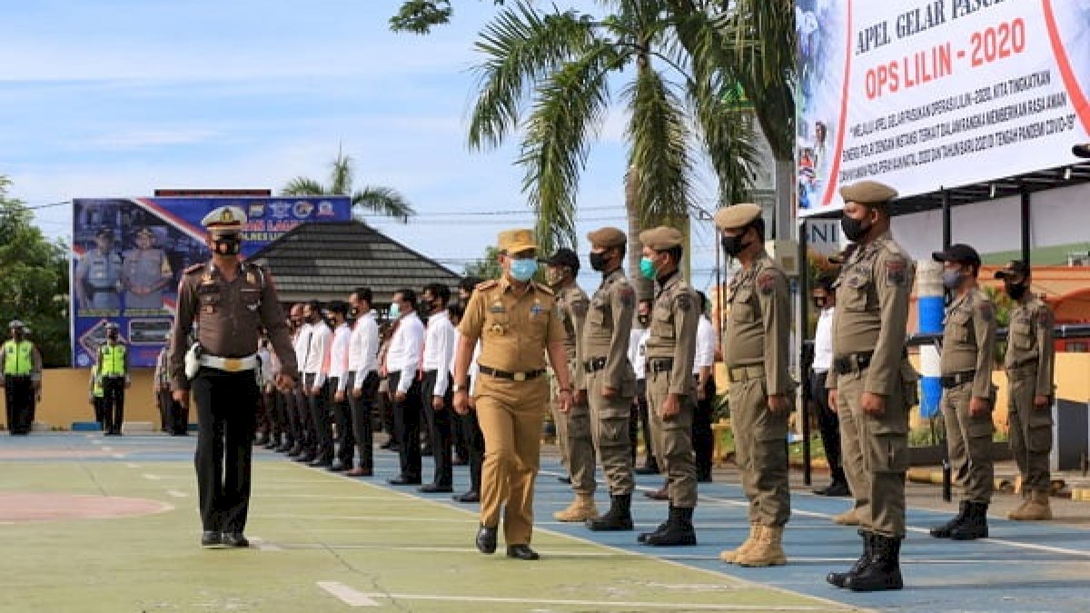 Hadiri Apel Operasi Lilin 2020, Sekda Lutim Ingatkan Protkes Covid-19