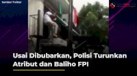VIDEO: Usai Dibubarkan, Polisi Turunkan Atribut dan Baliho FPI