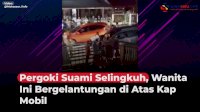 VIDEO: Pergoki Suami Selingkuh, Wanita Ini Bergelantungan di Atas Kap Mobil