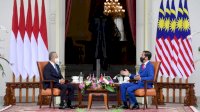 Jokowi dan PM Muhyiddin Yassin Bahas Isu Perlindungan WNI dan Diskriminasi Sawit
