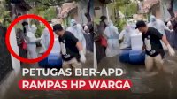 VIDEO: Aksi Petugas Ber-APD Rampas HP Warga saat Evakuasi Jenazah Covid-19