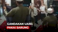 VIDEO: Viral, Pria Ini Gandakan Uang Pakai Sarung