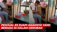 VIDEO: Viral, Penjual Es Suapi Anaknya yang Berada di dalam Gerobak