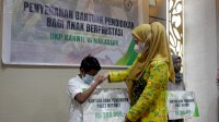 Peduli Pendidikan, Ikatan Istri Karyawan Pegadaian Makassar Salurkan Beasiswa untuk 56 Anak