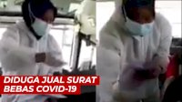 VIDEO: Viral, Wanita Berbaju Hazmat Diduga Jual Surat Bebas COVID-19