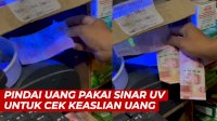 VIDEO: Aksi Pedagang Pindai Uang Pakai Sinar UV untuk Cek Keaslian Uang