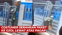 VIDEO: Tidak Manusiawi, Costumer Serahkan Paket ke Ojol Lewat Atas Pagar