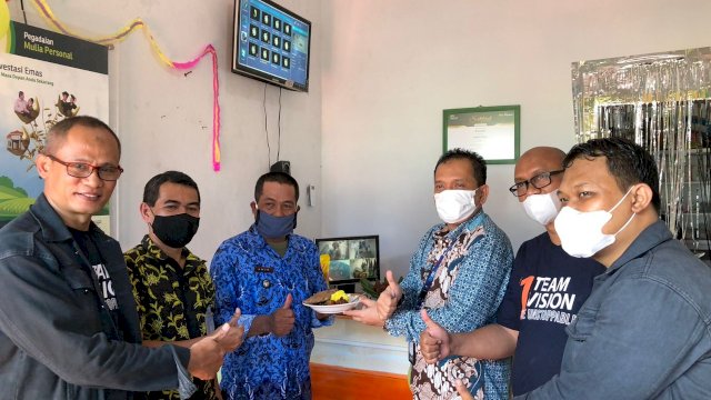 Pemimpin Wilayah Pegadaian Kanwil VI Makassar Zulfan Adam meresmikan Outlet Agen Pegadaian di Kota Makassar. Ist