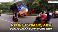 VIDEO: Nyaris Terbalik, Aksi Ugal-ugalan Sopir Mobil Truk Angkat Ban Kiri Kanan di Jalan Raya