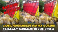 VIDEO: Mobil Pengangkut Minyak Goreng Kemasan Terbalik di Tol Cipali