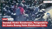 VIDEO: Hendak Parkir Kendaraan, Pengendara Ini Justru Buang Helm Kendaraan Lain