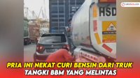VIDEO: Viral, Pria Ini Nekat Curi Bensin dari Truk Tangki BBM yang Melintas