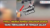 VIDEO: Viral, Warga Pungut Puluhan Dodol yang Terhambur di Tengah Jalan