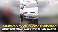 VIDEO: Kelewatan, Polisi Ini Ogah Mundurkan Mobilnya yang Halangi Jalan Warga