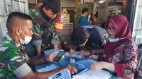 Camat Wajo Pantau dan Lakukan Vaksin Booster di Pasar Bacan Makassar