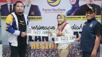 NasDem Makassar Serahkan STNK Peraih Hadiah Mobil Jalan Sehat Restorasi