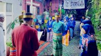 Peringati HUT Kota Makassar, Sekcam Wajo Bersama Pj RT/RW Gunakan Busana Traditional Bugis-Makassar