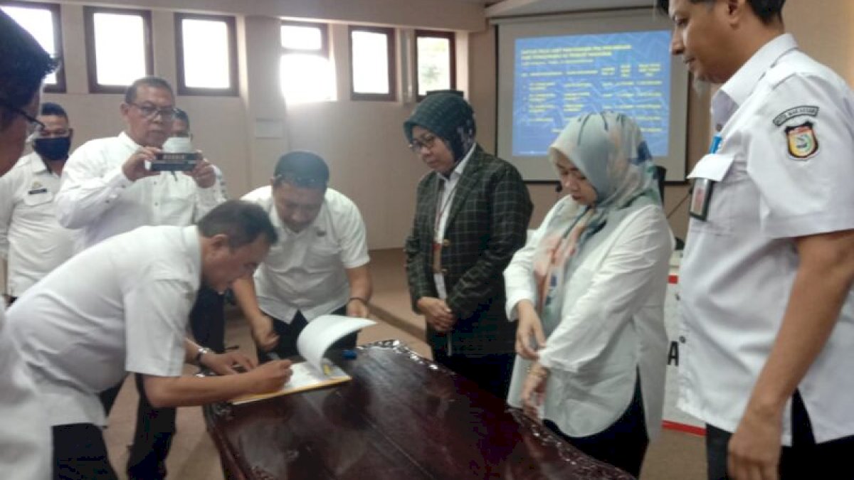 Disperkim Gelar Penyerahan PSU dari PT. Tunas Baru Sulawesi dan Warga Perumahan Taman Arthalia ke Pemkot Makassar