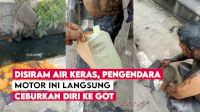 VIDEO: Disiram Air Keras, Pengendara Motor Ini Langsung Ceburkan Diri ke Got