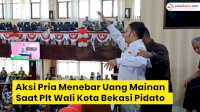 VIDEO: Aksi Pria Menebar Uang Mainan Saat Plt Wali Kota Bekasi Pidato di Rapat Paripurna