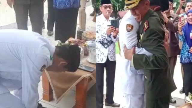 Dandim 1425 Jeneponto Letkol Inf Agus Tanra berikan sepatunya ke salah seorang anggota Paskibraka yang sepatunya nyaris copot (Int)