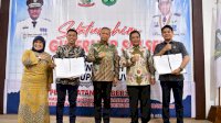 Pj Gubernur Bahtiar Saksikan Penandatanganan NPHD Pilkada 2024 Kabupaten Luwu