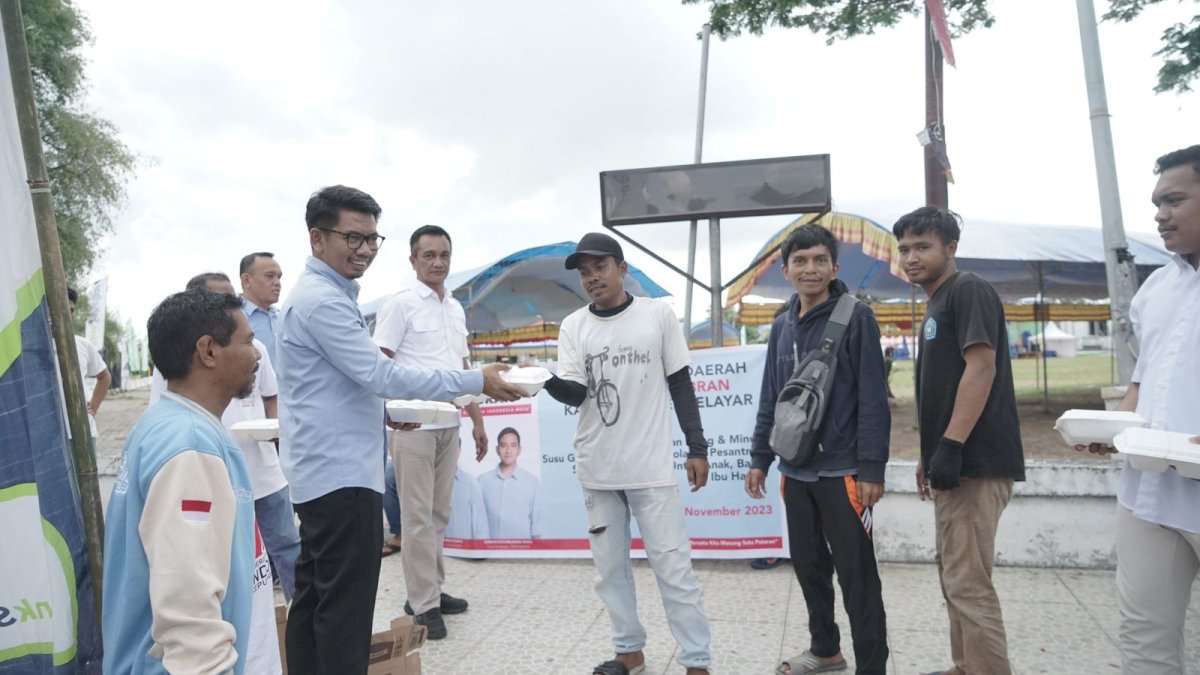 Natsir Ali Pimpin TKD Prabowo-Gibran Selayar Bagi Makan Siang dan Susu Gratis di Hari Perdana Kampanye