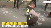 VIDEO: Uang Puluhan Juta Berserakan di Jalan Poros Tonasa Pangkep