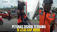VIDEO: Viral, Petugas Dishub Terbawa di Atas Kap Mobil