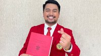 Politisi Muda Golkar Sulsel Zulham Arief Sukses Raih Gelar Magister Kenotariatan di Unhas