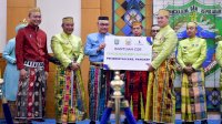 HUT ke-64 Pangkep, Pj Gubernur Sulsel Serahkan Bantuan dan Resmikan Proyek Pembangunan