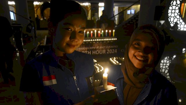 Claro Makassar bersama Eart Hour matikan lampu selama satu jam. Foto: Istimewa