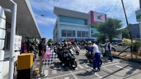 Rolling City Touring Honda PCX Club Indonesia Ramaikan Jalan di Makassar