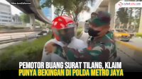VIDEO: Pemotor Buang Surat Tilang, Klaim Punya Bekingan di Polda Metro Jaya