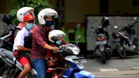 Ini Tips #Cari_Aman Asmo Sulsel Saat Bonceng Anak Naik Sepeda Motor