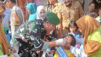 Dandim 1425 Jeneponto Kerahkan Babinsa Dampingi Petugas Kesehatan Pemberian Vaksin Imunisasi Polio