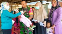 Dampingi Imunisasi Polio, Wujud Komitmen Babinsa Kodim 1425 Jeneponto Dukung Kesehatan Anak